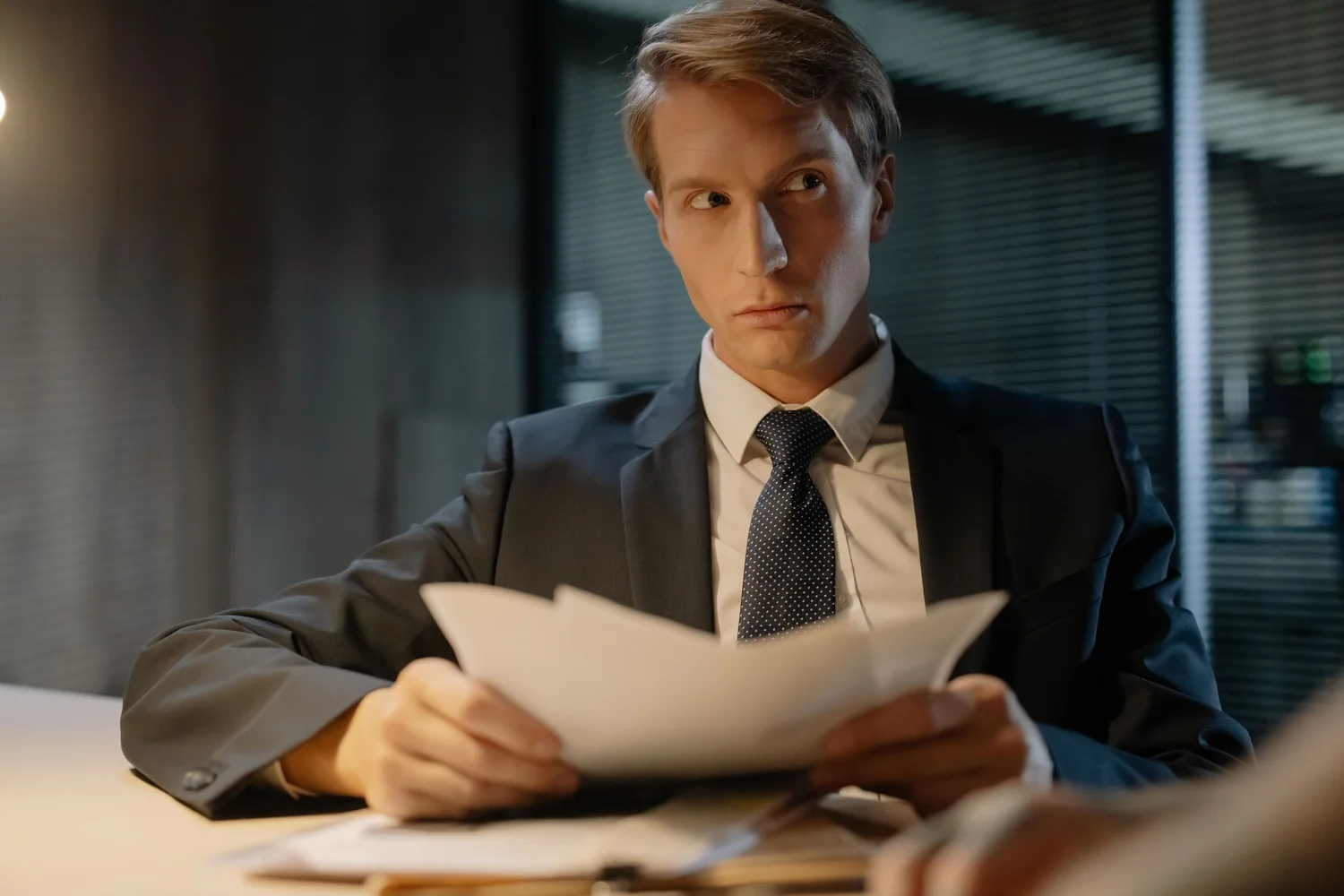 Lawyer reading a case file before acting under a power of attorney