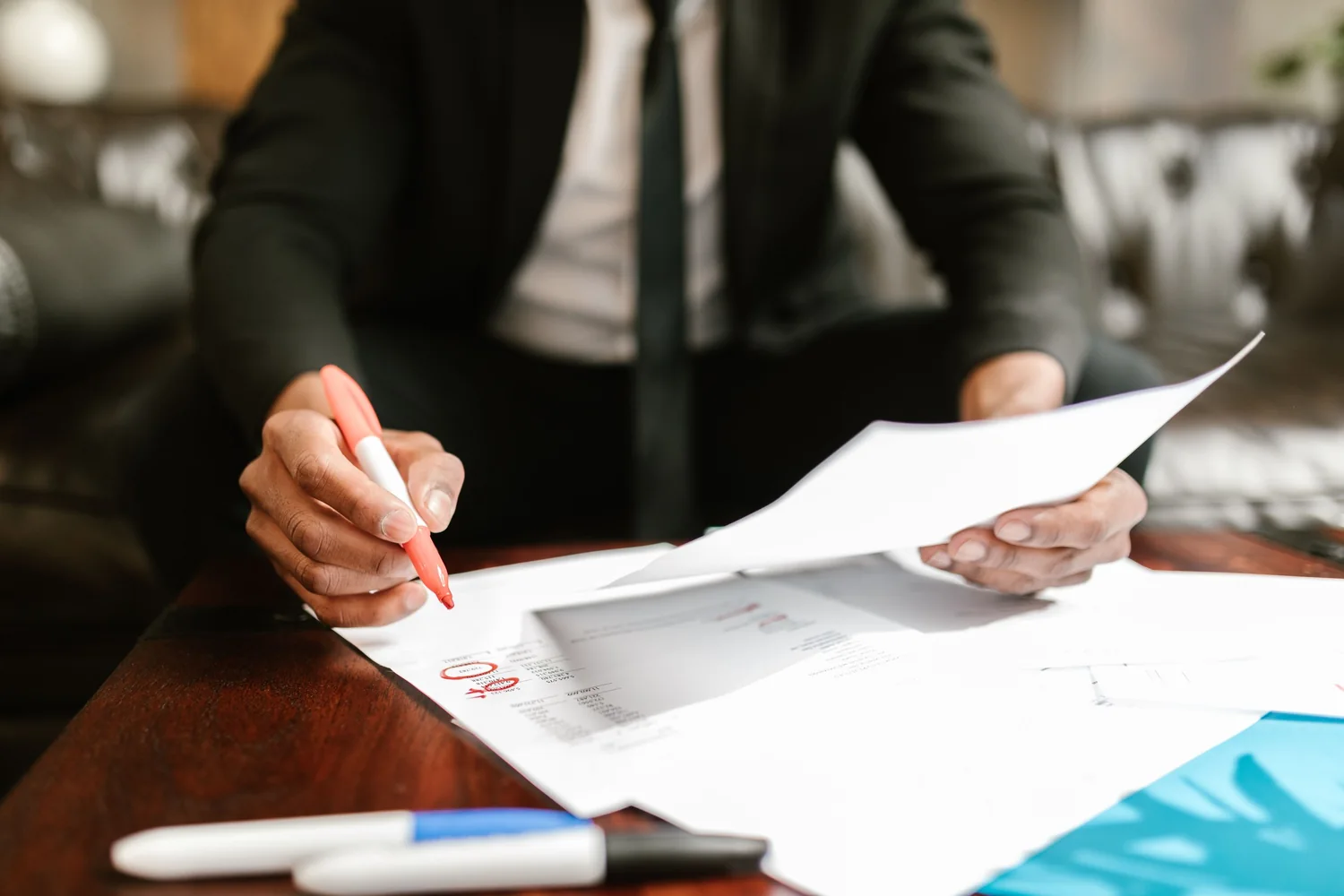 Client and lawyer going through the powers a litigation power of attorney has to name