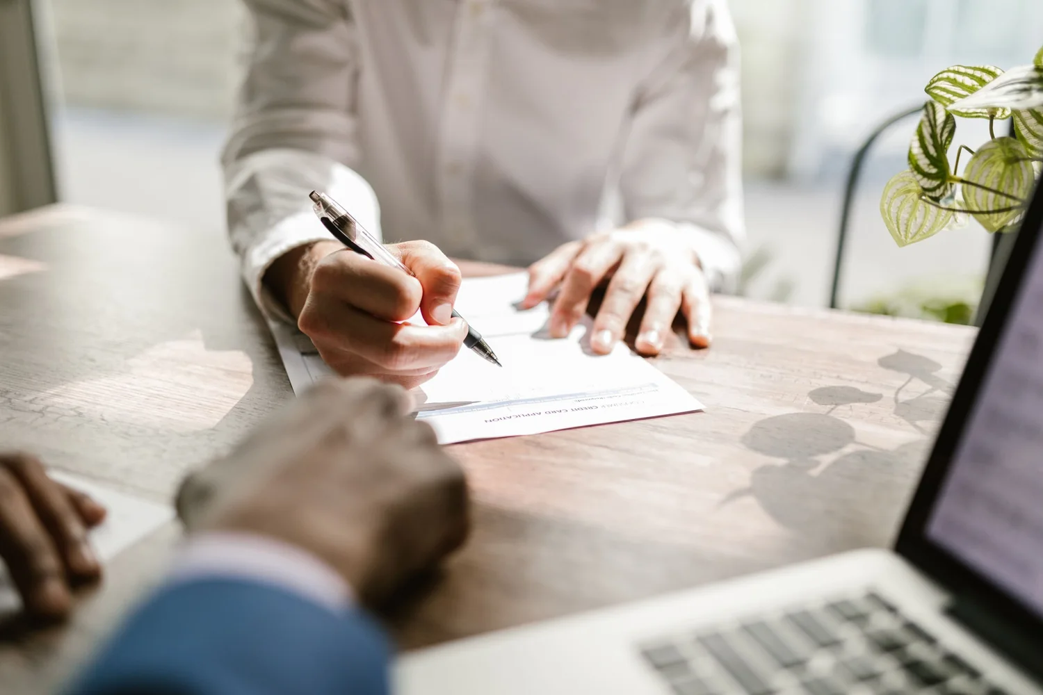 Signing a facility through an agent who has been given the authority to do it