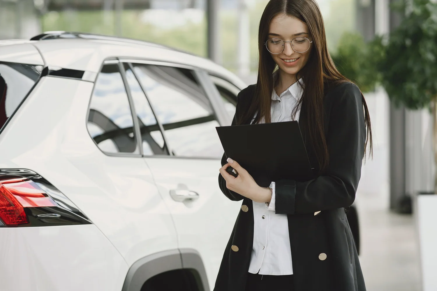 Vehicle paperwork checked against the car before a sale through an agent