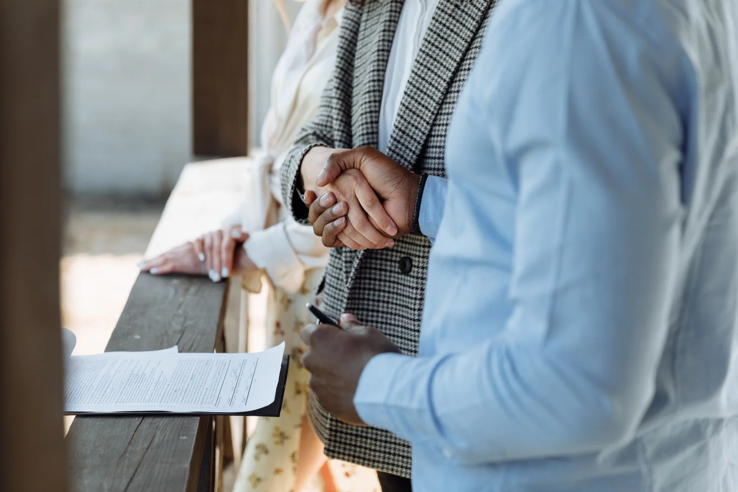 Title deed and identity documents being checked before a property power of attorney is drafted