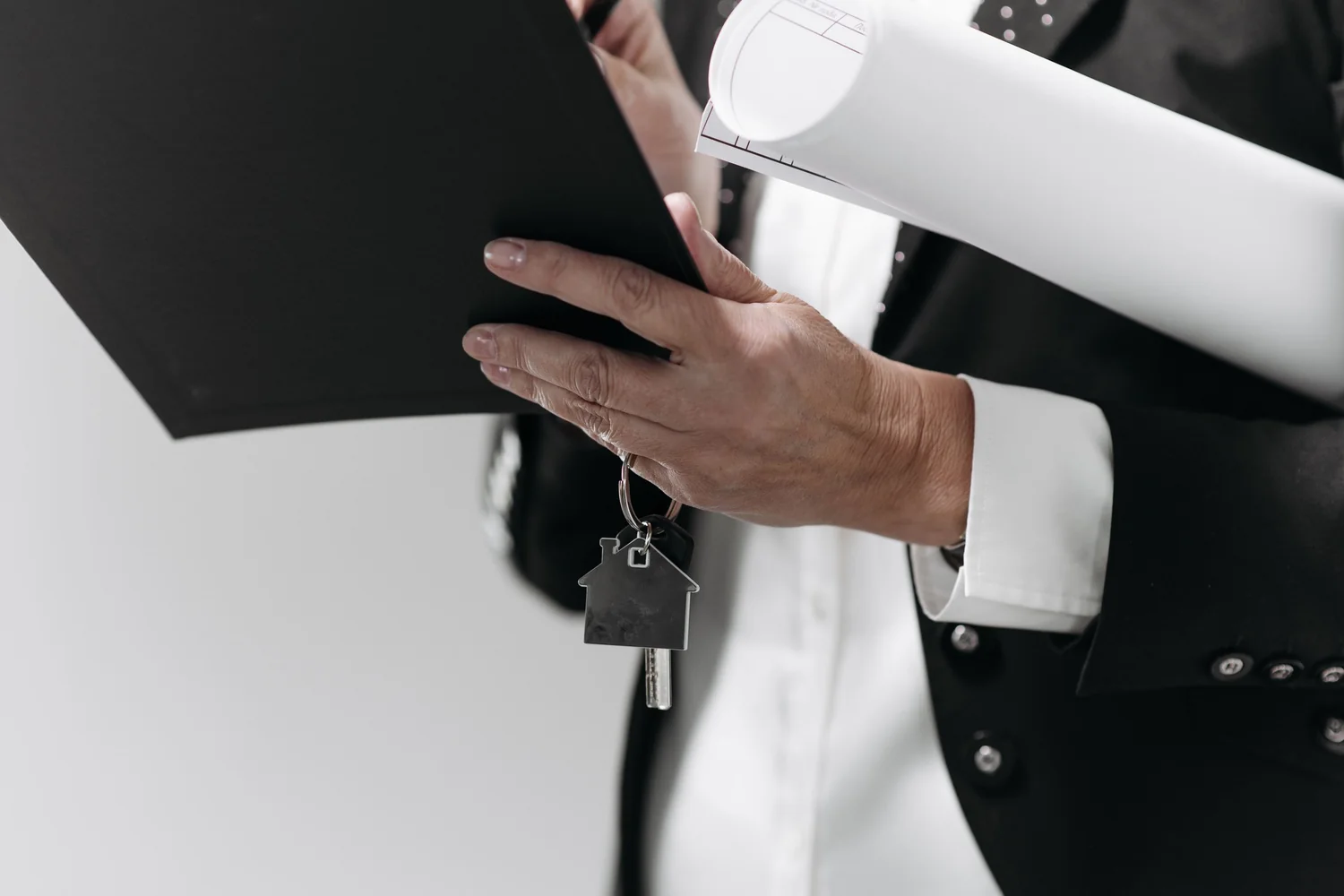 Keys and plans for a property sold through an appointed agent